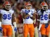 University of Florida defensive players Keivonnis Davis, David Reese and Marcell Harris on the field against Florida State- Florida Gators football- 1280x852