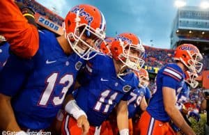 University of Florida freshmen quarterbacks Feleipe Franks (13) and Kyle Trask (11) run out onto the field to take on North Texas- Florida Gators football- 1280x855