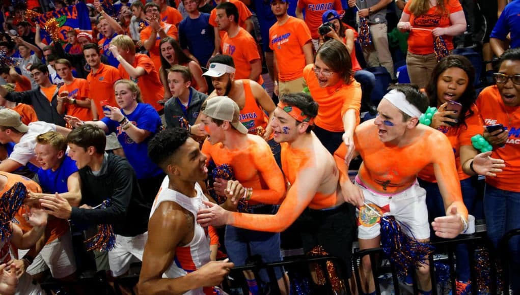 Florida Gators basketball player Devin Robinson celebrates with fans- 1280x855