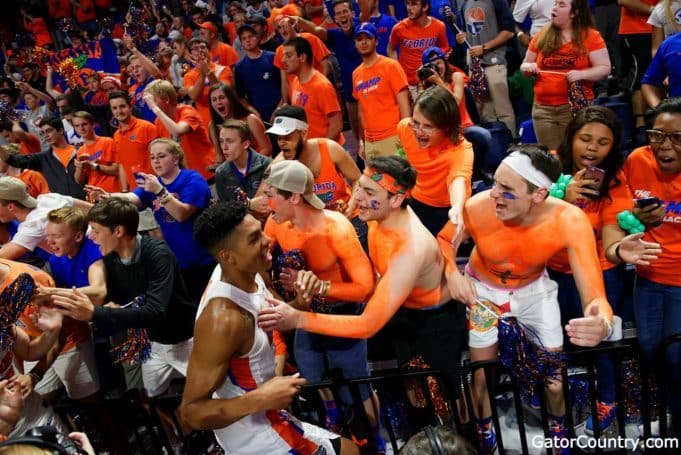 Florida Gators basketball player Devin Robinson celebrates with fans- 1280x855