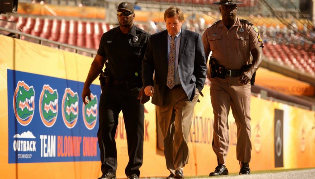 University of Florida head coach Jim McElwain walks around Raymond James Stadium before the Outback Bowl- Florida Gators football- 1280x852