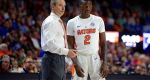 University of Florida men’s basketball coach Mike White talks to guard Eric Hester during a blowout win over the Kentucky Wildcats- Florida Gators basketball- 1280x852
