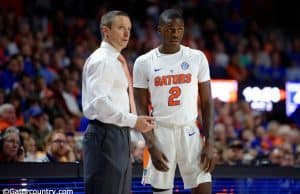 University of Florida men’s basketball coach Mike White talks to guard Eric Hester during a blowout win over the Kentucky Wildcats- Florida Gators basketball- 1280x852