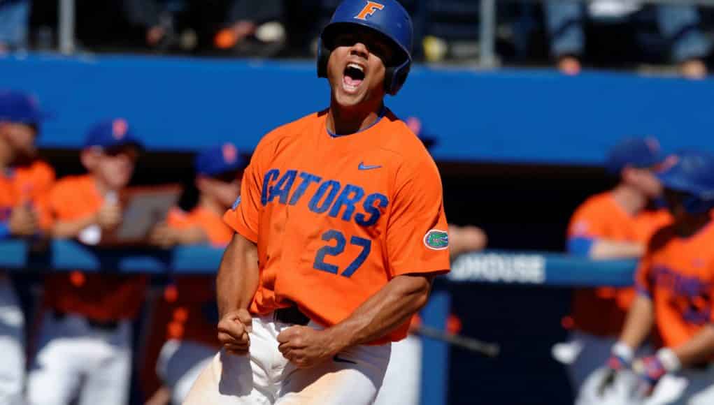 University of Florida outfielder Nelson Maldonado celebrates after scoring to give the Gators a 2-1 lead over Miami- Florida Gators baseball- 1280x852