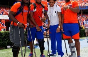 University of Florida players Dre Massey, Antonio Riles, C.J. McWilliams and Quincy Lenton watch the Gators play Kentucky- Florida Gators football- 1280x1280