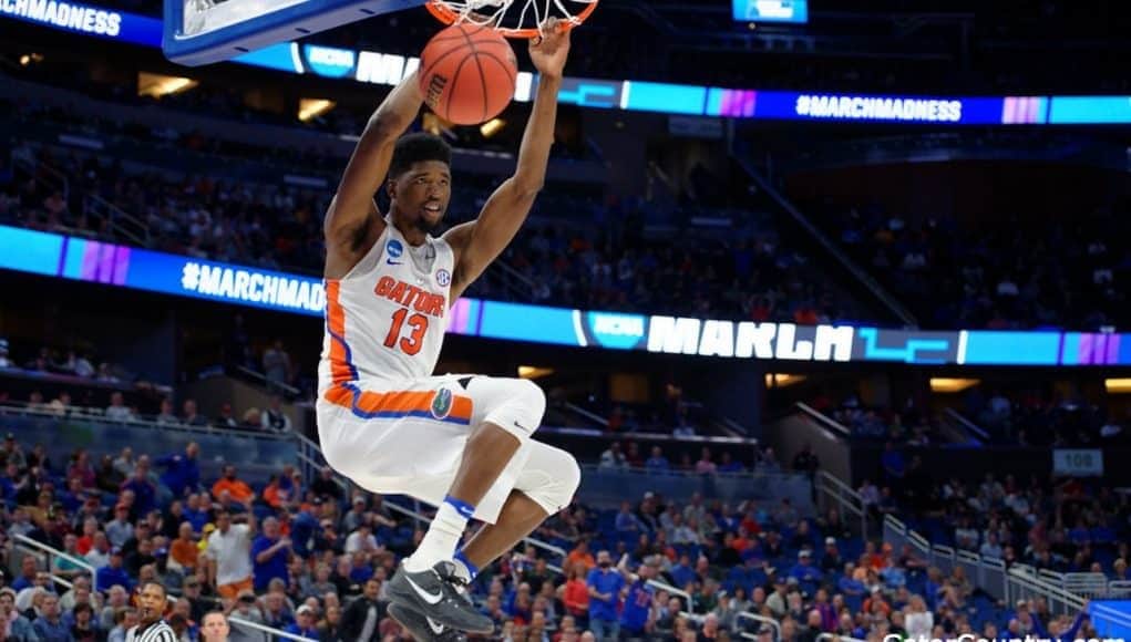 Florida Gators baskeball player Kevarious Hayes dunks against ETSU- 1280x853