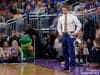 Florida Gators basketball coach Mike White looks on as the Gators play in the NCAA tournament- 1280x853