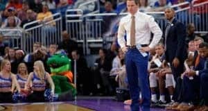 Florida Gators basketball coach Mike White looks on as the Gators play in the NCAA tournament- 1280x853