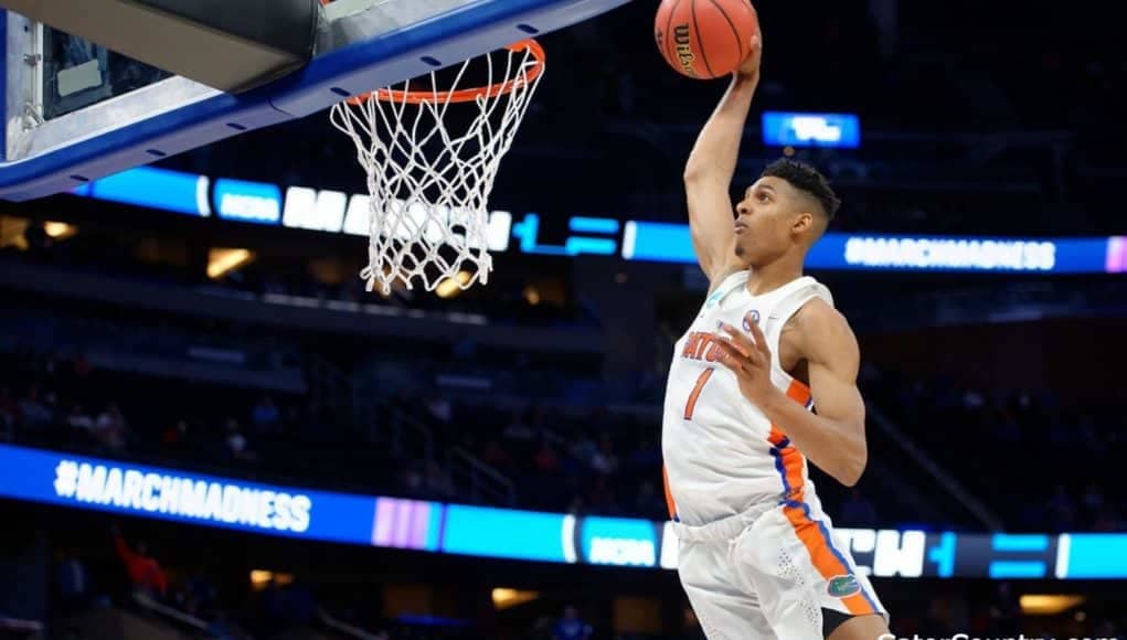 Florida Gators basketball player Devin Robinson dunks against ETSU- 1280x853