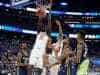 Florida Gators basketball player Gorjok Gak dunks against ETSU- 1280x853