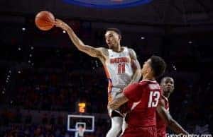 Florida Gators basketball point guard Chris Chiozza passes against Arkansas- 1280x853