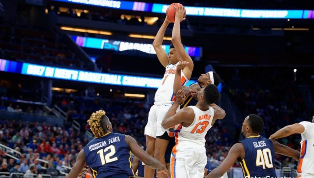 Florida Gators forward Devin Robinson goes up for a rebound in the NCAA tournament- 1280x853