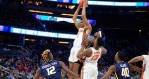 Florida Gators forward Devin Robinson goes up for a rebound in the NCAA tournament- 1280x853