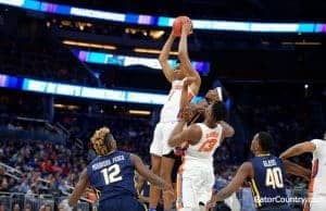 Florida Gators forward Devin Robinson goes up for a rebound in the NCAA tournament- 1280x853