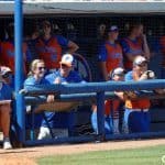 Florida Gators softball team watches on from the dugout- 1280x549