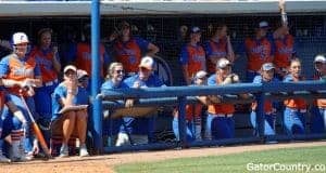 Florida Gators softball preview for Arkansas series Florida Gators softball team watches on from the dugout- 1280x549