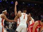 Mar 24, 2017; New York, NY, USA; Florida Gators guard Chris Chiozza (11) celebrates making the game winning shot against the Wisconsin Badgers in the semifinals of the East Regional of the 2017 NCAA Tournament at Madison Square Garden. Mandatory Credit: Brad Penner-USA TODAY Sports