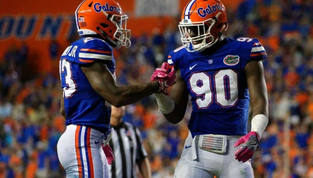 University of Florida defensive end Antonneous Clayton celebrates with defensive back Chauncey Gardner in a win over Missouri- Florida Gators football- 1280x855