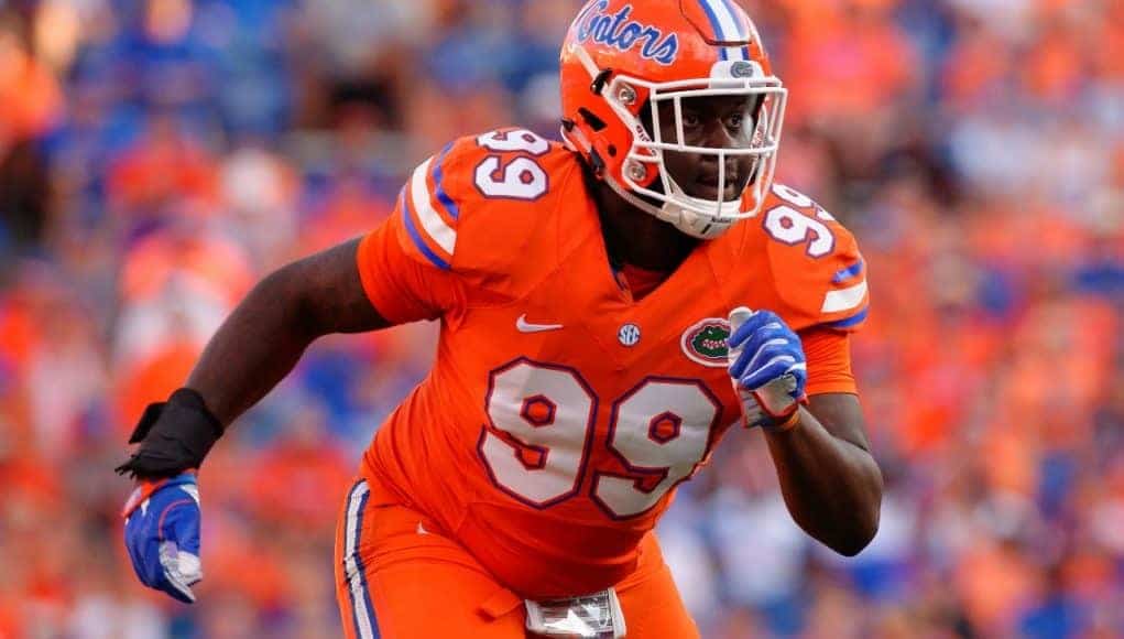 University of Florida defensive lineman Jachai Polite rushing the quarterback against the Kentucky Wildcats- Florida Gators football- 1280x852