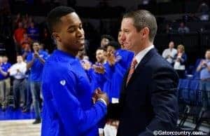 University of Florida head coach Mike White greets Kasey Hill during Senior Night ceremonies- Florida Gators basketball- 1820x854