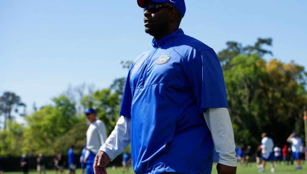 University of Florida linebackers coach Tim Skipper watches the team go through drills during spring practice- Florida Gators football- 1280x854