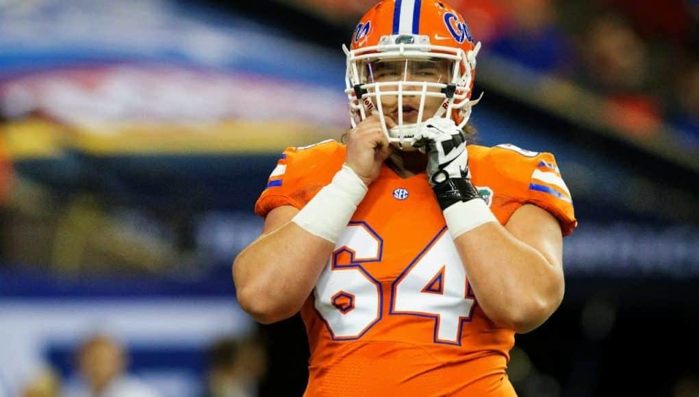 University of Florida offensive lineman Tyler Jordan fixes his helmet during the 2016 SEC Championship game- Florida Gators football- 1280x852