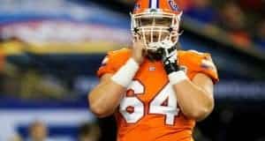 University of Florida offensive lineman Tyler Jordan fixes his helmet during the 2016 SEC Championship game- Florida Gators football- 1280x852