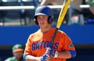 University of Florida outfielder Austin Langworthy gets a sign before stepping into the box against Miami- Florida Gators baseball- 1280x942