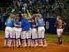 Florida Gators softball team huddles after a big win- 1280x852