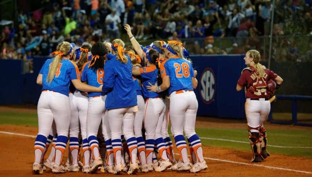 Florida Gators softball team huddles after a big win- 1280x852