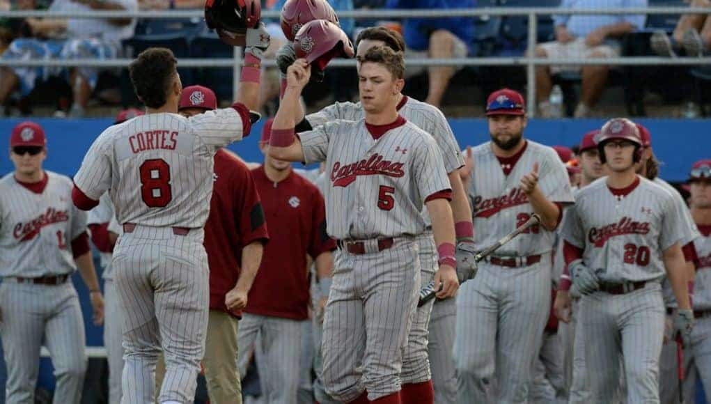 South Carolina left fielder Carlos Cortes celebrates a two-run home run in the first inning of a 4-2 win over the Florida Gators- Florida Gators baseball- 1280x852