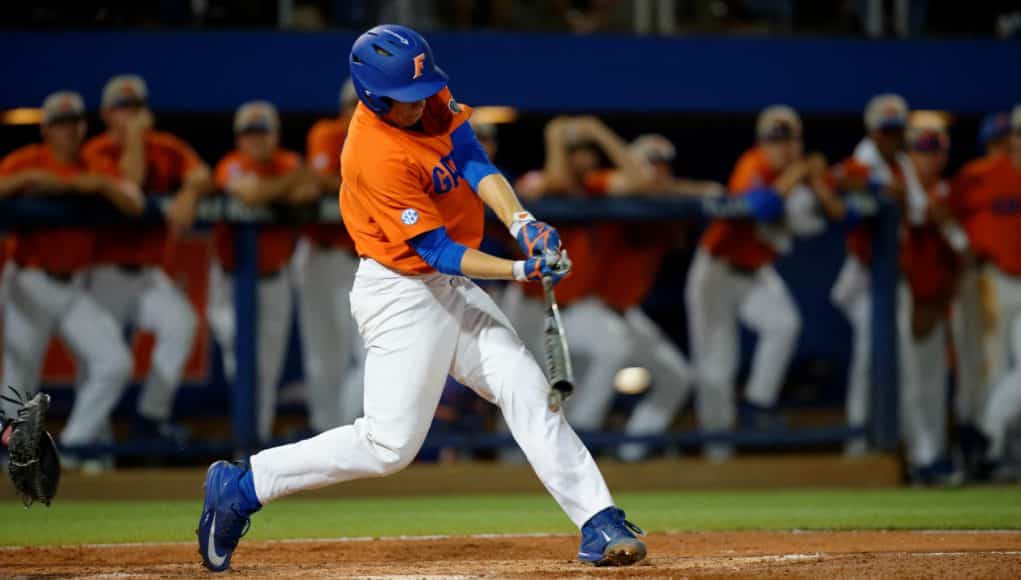 University of Florida first baseman JJ Schwarz singles up the middle against the South Carolina Gamecocks- Florida Gators baseball- 1280x852