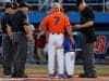 University of Florida head baseball coach Kevin O’Sullivan and his son Finn deliver the starting lineups to the umpire- Florida Gators baseball- 1280x852