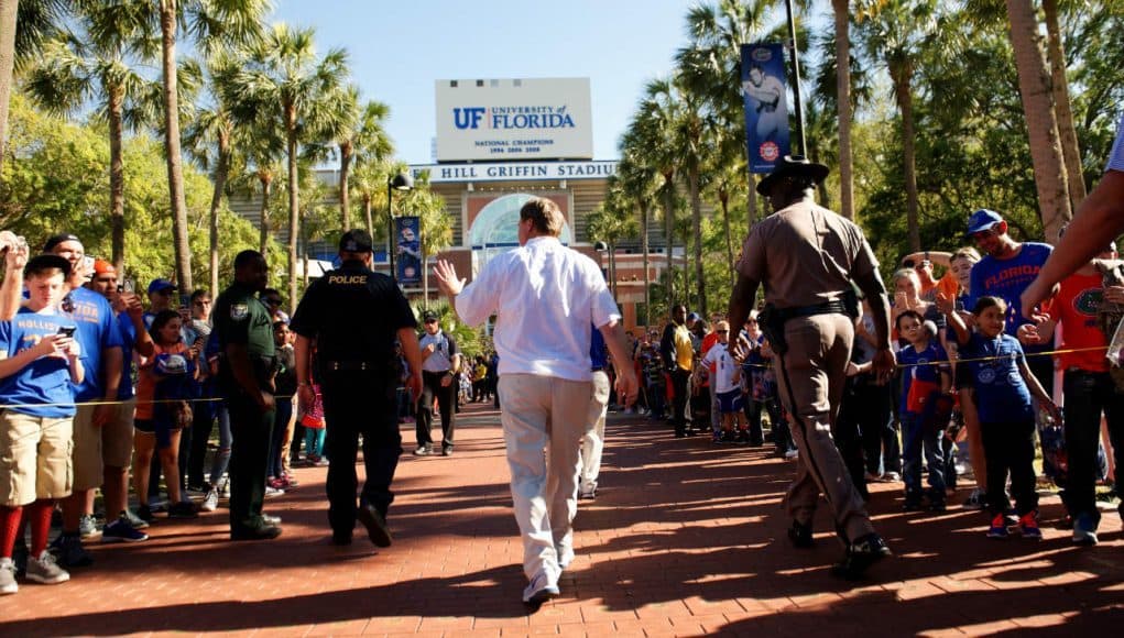 University of Florida head football coach Jim McElwain leads his football team into Ben Hill Griffin Stadium before the Orange and Blue Debut- Florida Gators football- 1280x854