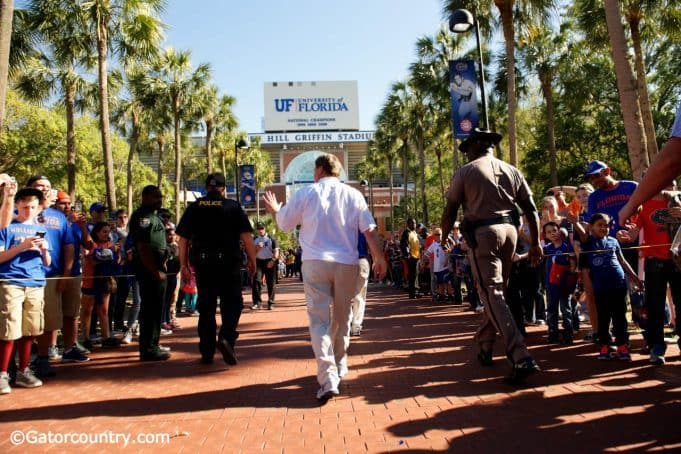 University of Florida head football coach Jim McElwain leads his football team into Ben Hill Griffin Stadium before the Orange and Blue Debut- Florida Gators football- 1280x854