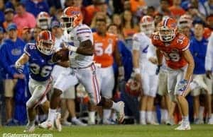 University of Florida quarterback Kadarius Toney runs for a first down during the Orange and Blue Debut- Florida Gators football- 1280x852