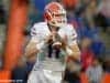 University of Florida quarterback Kyle Trask rolls out before throwing a pass in the Orange and Blue Debut- Florida Gators football- 1280x852