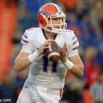 University of Florida quarterback Kyle Trask rolls out before throwing a pass in the Orange and Blue Debut- Florida Gators football- 1280x852