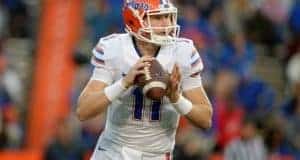 University of Florida quarterback Kyle Trask rolls out before throwing a pass in the Orange and Blue Debut- Florida Gators football- 1280x852