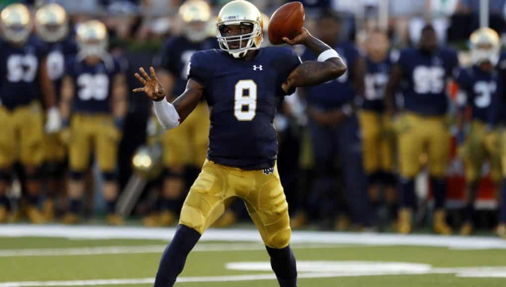 Sep 5, 2015; South Bend, IN, USA; Notre Dame Fighting Irish quarterback Malik Zaire (8) throws a pass against the Texas Longhorns at Notre Dame Stadium. Mandatory Credit: Brian Spurlock-USA TODAY Sports