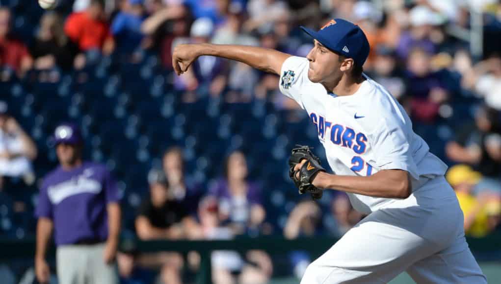 Jun 18, 2017; Omaha, NE, USA; Florida Gators pitcher Alex Faedo (21) pitches in the first inning against the TCU Horned Frogs at TD Ameritrade Park Omaha. Mandatory Credit: Steven Branscombe-USA TODAY Sports