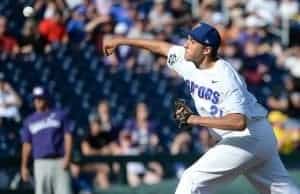 Jun 18, 2017; Omaha, NE, USA; Florida Gators pitcher Alex Faedo (21) pitches in the first inning against the TCU Horned Frogs at TD Ameritrade Park Omaha. Mandatory Credit: Steven Branscombe-USA TODAY Sports