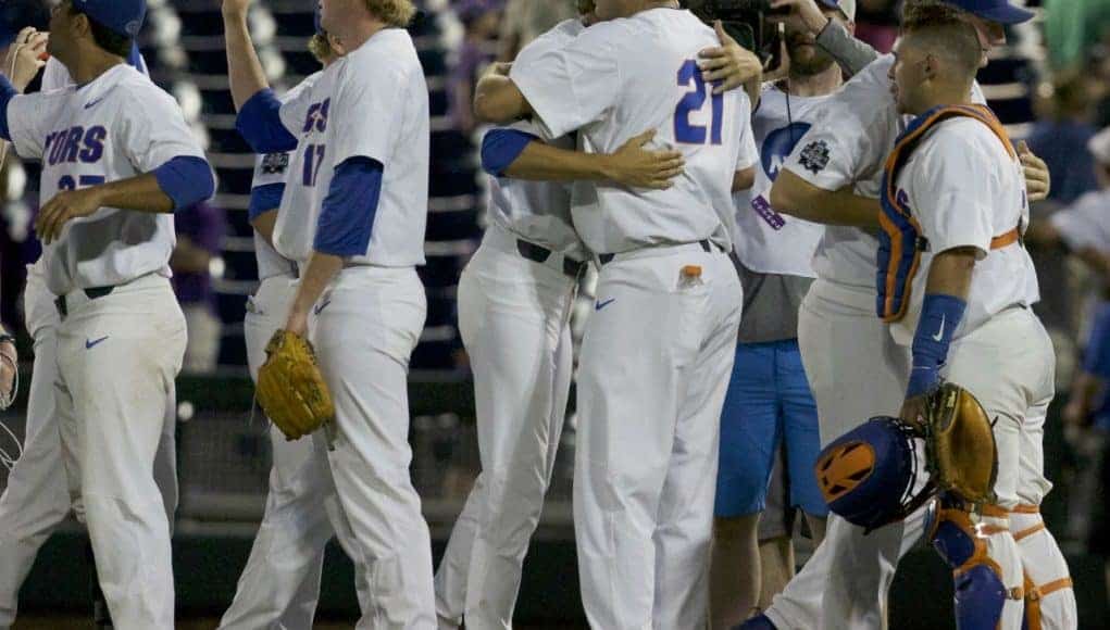 Jun 18, 2017; Omaha, NE, USA; Florida Gators pitcher Alex Faedo (21) and pitcher Michael Byrne (17) celebrate after defeating the TCU Horned Frogs at TD Ameritrade Park Omaha. Florida won 3-0. Mandatory Credit: Bruce Thorson-USA TODAY Sports