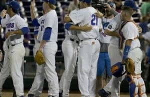 Jun 18, 2017; Omaha, NE, USA; Florida Gators pitcher Alex Faedo (21) and pitcher Michael Byrne (17) celebrate after defeating the TCU Horned Frogs at TD Ameritrade Park Omaha. Florida won 3-0. Mandatory Credit: Bruce Thorson-USA TODAY Sports