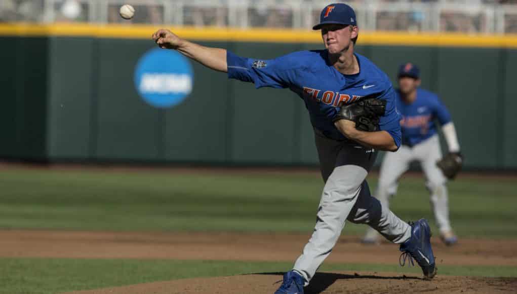 Jun 20, 2017; Omaha, NE, USA; Florida Gators pitcher Brady Singer (51) throws agains the Louisville Cardinals in the first inning at TD Ameritrade Park Omaha. Mandatory Credit: Bruce Thorson-USA TODAY Sports