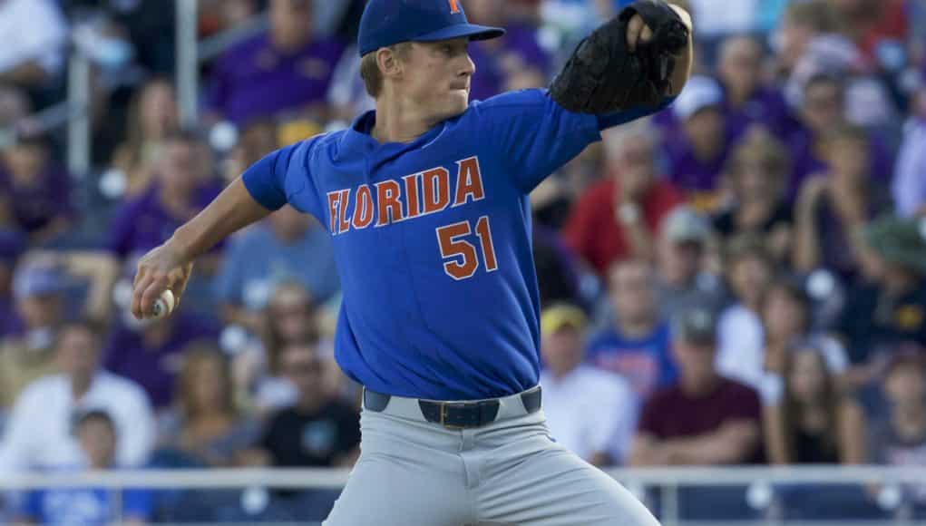 Jun 26, 2017; Omaha, NE, USA; Florida Gators pitcher Brady Singer (51) throws against the LSU Tigers in the first inning in game one of the championship series of the 2017 College World Series at TD Ameritrade Park Omaha. Mandatory Credit: Bruce Thorson-USA TODAY Sports