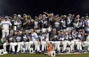 Jun 27, 2017; Omaha, NE, USA; Florida Gators players and coaches celebrate with the national championship trophy after the game against the LSU Tigers in game two of the championship series of the 2017 College World Series at TD Ameritrade Park Omaha. Mandatory Credit: Steven Branscombe-USA TODAY Sports