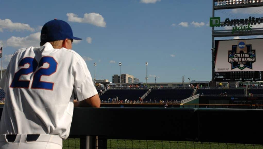 University of Florida catcher JJ Schwarz watches TCU take infield before the Gators and Frogs play in the College World Series- Florida Gators baseball- 1280x850