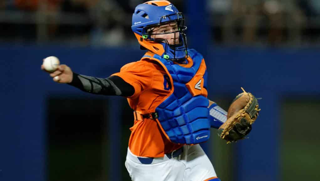 University of Florida catcher Mark Kolozsvary fires a baseball to first against South Carolina- Florida Gators baseball- 1280x852