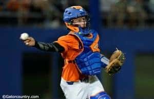 University of Florida catcher Mark Kolozsvary fires a baseball to first against South Carolina- Florida Gators baseball- 1280x852